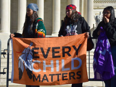 Native youth rally in front of the Supreme Court on November 9, 2022.
