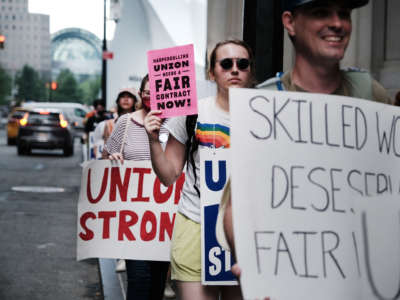 HarperCollins workers, who are demanding a living wage, have been without a contract since April. On November 10, 2022, they began an open-ended strike, building off the one-day strike that they held on July 20, 2022 (pictured here).