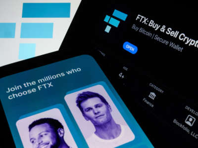 In this photo illustration the FTX logo and mobile app adverts are displayed on screens.