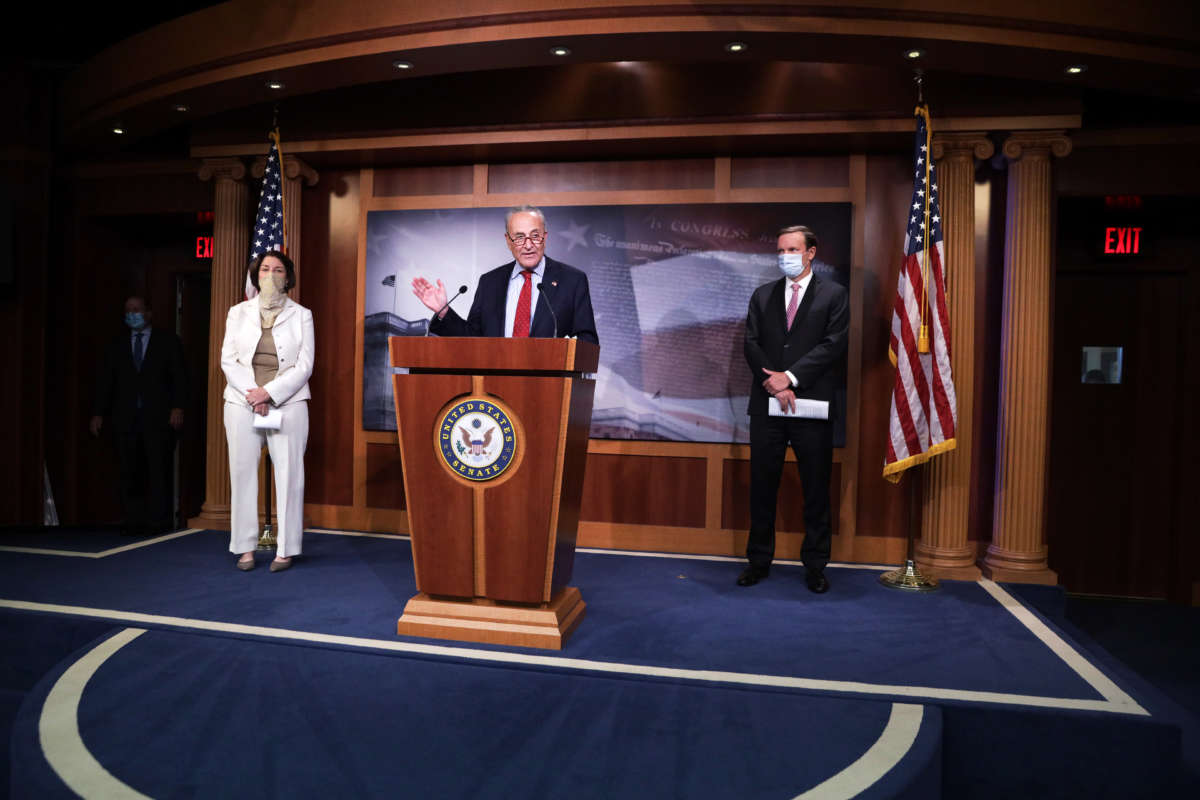 Then-Senate Minority Leader Chuck Schumer speaks as Senators Amy Klobuchar and Chris Murphy listen during a news conference at the U.S. Capitol on August 4, 2020, in Washington, D.C.