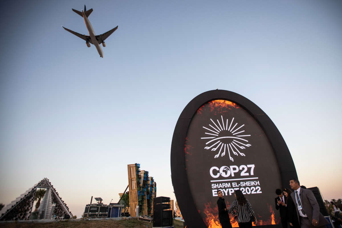 A plane flies over the Green Zone of the 2022 United Nations Climate Change Conference COP27 in Sharm El-Sheikh, Egypt.