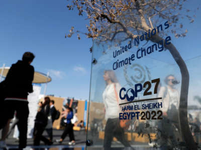 Participants arrive at the Sharm el-Sheikh International Convention Centre, during the COP27 climate conference in Egypt's Red Sea resort city of the same name, on November 17, 2022.