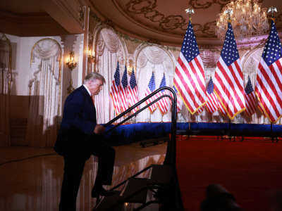 Former President Donald Trump arrives on stage to speak during an event at his Mar-a-Lago home on November 15, 2022, in Palm Beach, Florida.