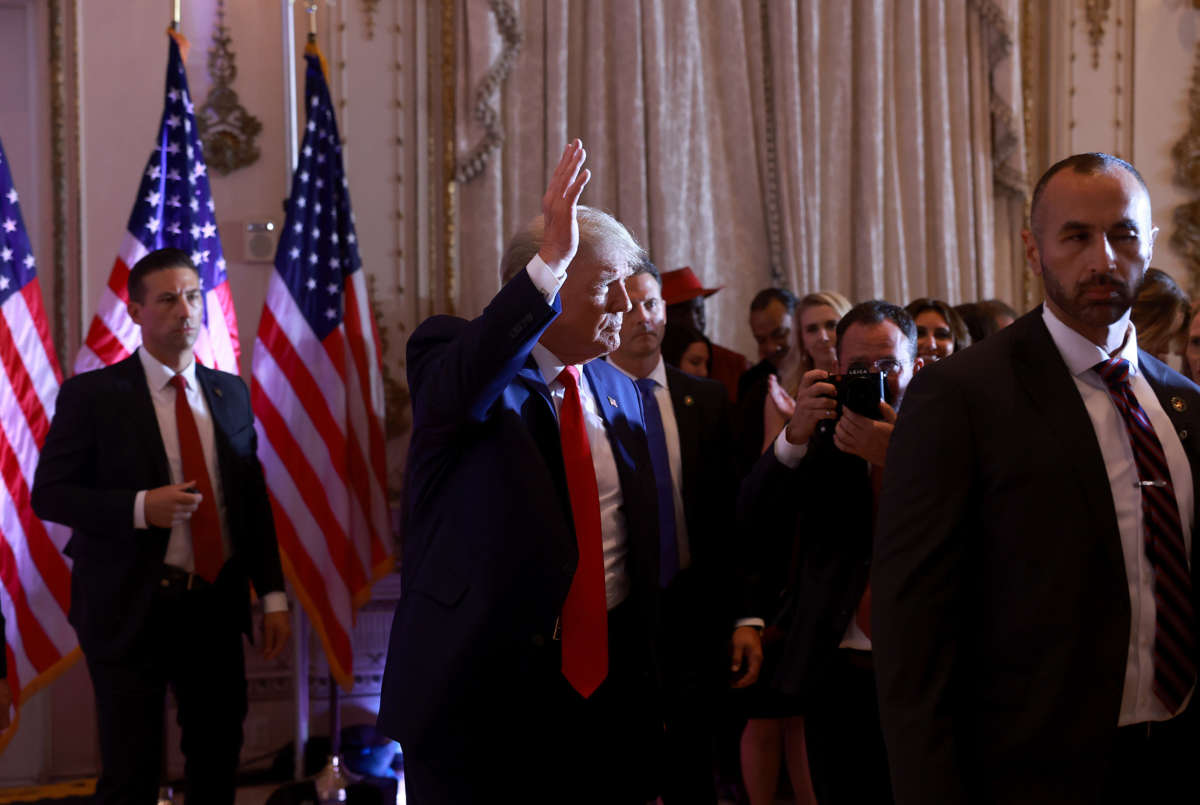 Former President Donald Trump waves after speaking during an event at his Mar-a-Lago home on November 15, 2022, in Palm Beach, Florida.