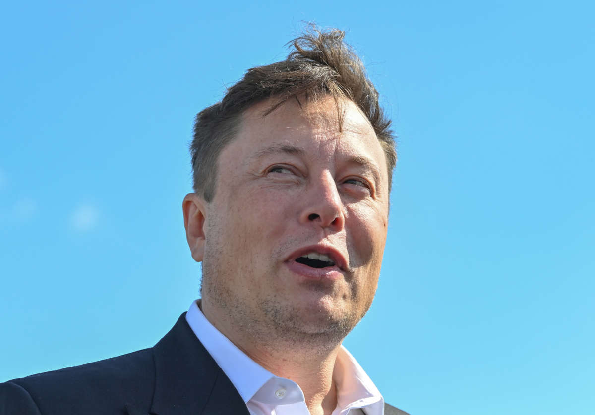 Elon Musk stands on the construction site of the Tesla Gigafactory in Grünheide near Berlin, on September 3, 2020.