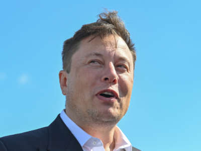 Elon Musk stands on the construction site of the Tesla Gigafactory in Grünheide near Berlin, on September 3, 2020.