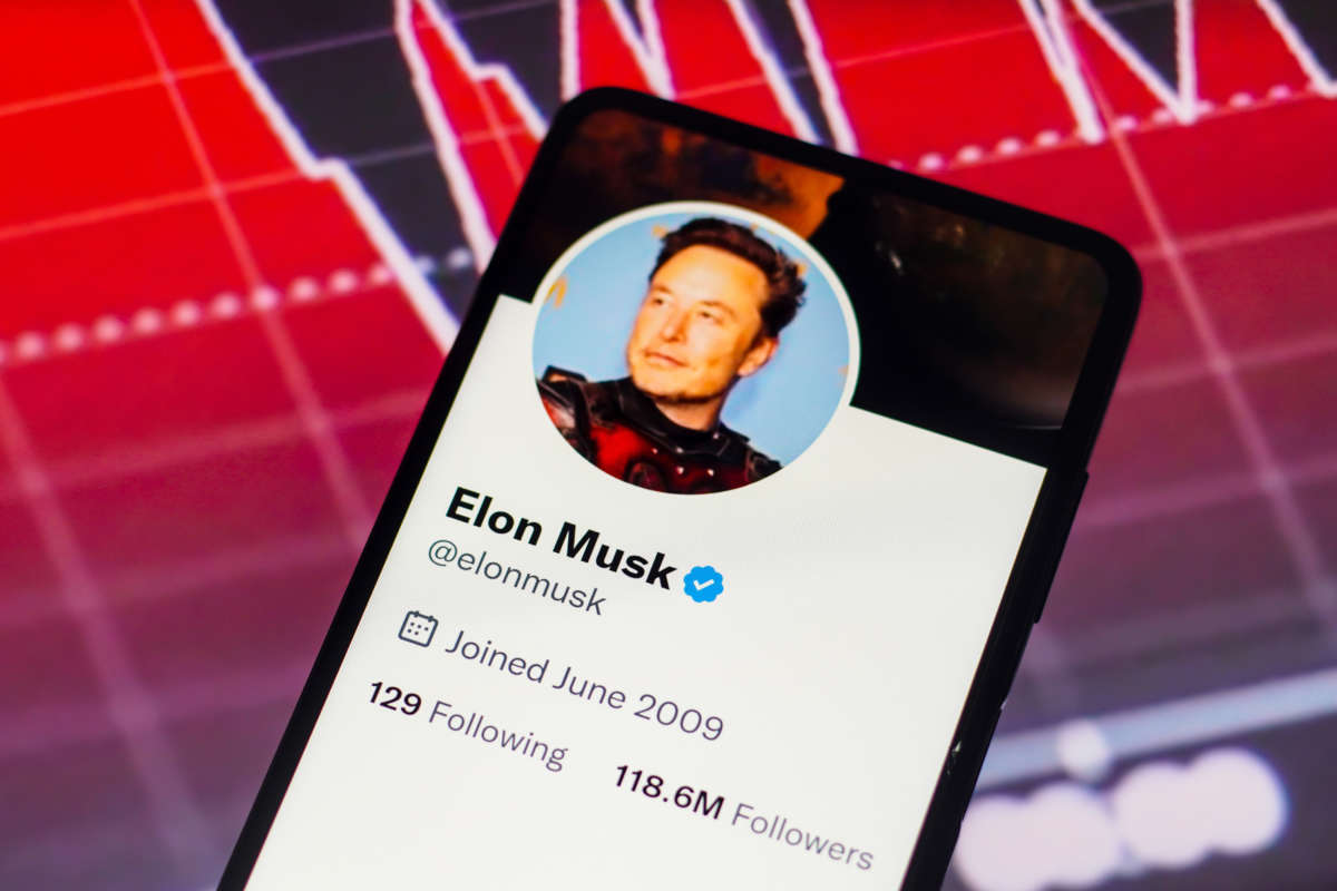 Elon Musk's Twitter account is seen displayed on a smartphone screen.
