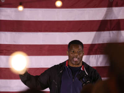 Georgia Republican Senate candidate Herschel Walker speaks during a campaign rally on November 28, 2022, in Cumming, Georgia.