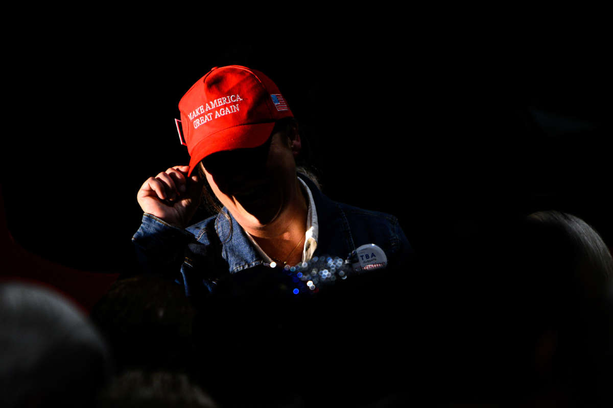 A supporter wears a Make America Great Again hat at a rally for Oregon gubernatorial candidate Christine Drazan on October 18, 2022, in Aurora, Oregon.