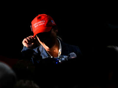 A supporter wears a Make America Great Again hat at a rally for Oregon gubernatorial candidate Christine Drazan on October 18, 2022, in Aurora, Oregon.