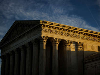 The rising sun creeps across the Supreme Court on November 8, 2022, in Washington, D.C.