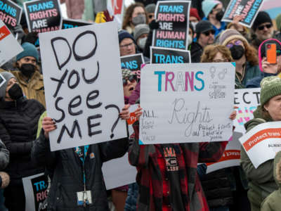 People protest in support of trans rights in St. Paul, Minnesota, on March 6, 2022.