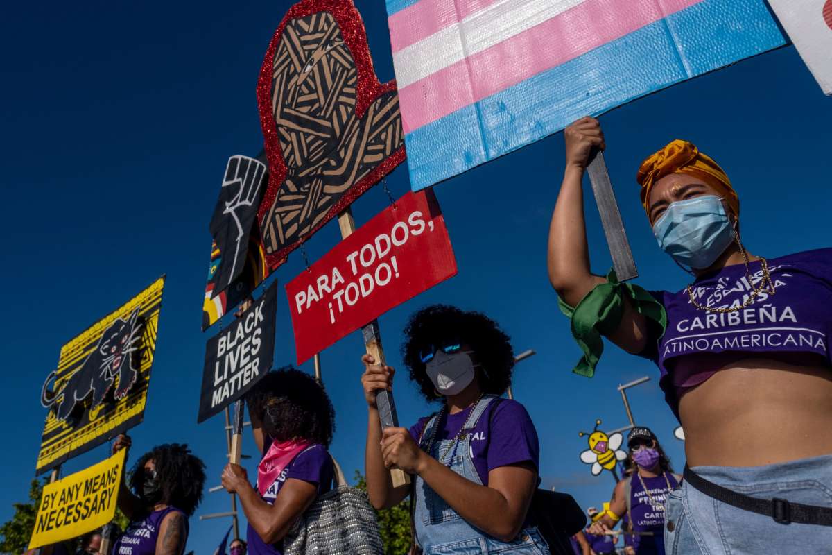 Activists take part in a demonstration to mark International Women's Day in San Juan, Puerto Rico on March 8, 2021.