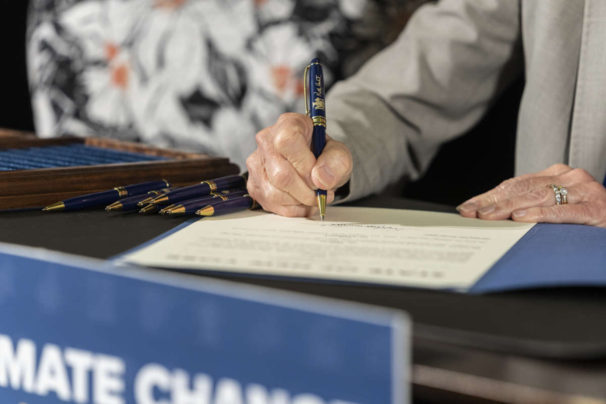 New York Governor Kathy Hochul signs bills to strengthen the state's commitment to clean energy development and energy efficiency at the Brooklyn Navy Yard in Brooklyn, New York.