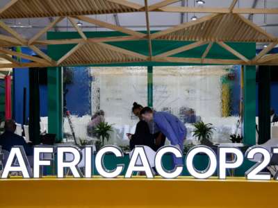 Participants and delegates work in the Africa Pavilion at the Sharm El-Sheikh International Convention Centre, on the first day of the COP27 climate summit in Sharm El-Sheikh, Egypt on November 6, 2022.