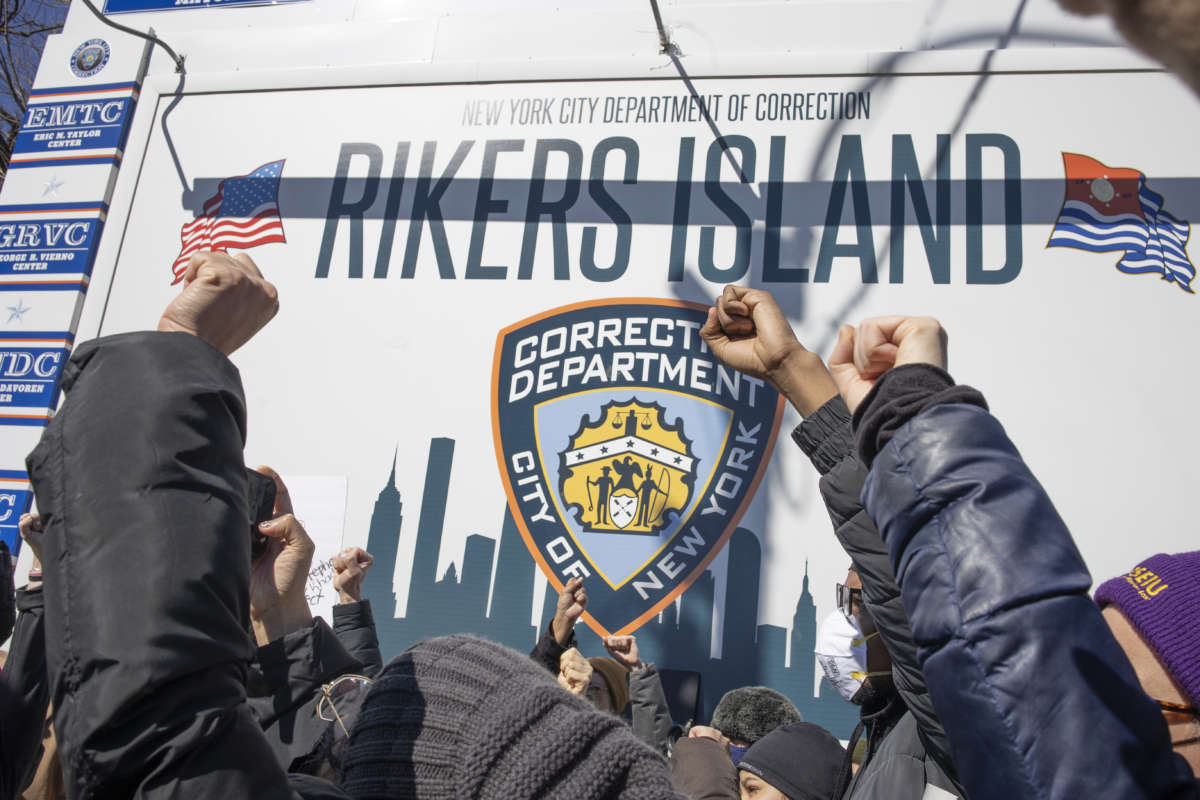 Activists demand the closure of Rikers Island jail on February 28, 2022 at the gate to Rikers Island in Queens, New York.