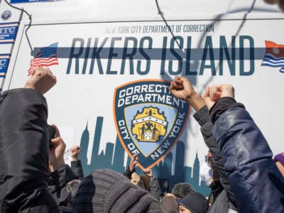 Activists demand the closure of Rikers Island jail on February 28, 2022 at the gate to Rikers Island in Queens, New York.