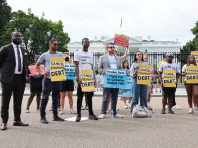 Student loan borrowers stage a rally in front of the White House to celebrate President Biden canceling student debt and to begin the fight to cancel any remaining debt on August 25, 2022, in Washington, D.C.