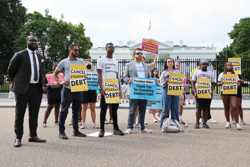Student loan borrowers stage a rally in front of the White House to celebrate President Biden canceling student debt and to begin the fight to cancel any remaining debt on August 25, 2022, in Washington, D.C.