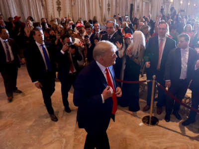 Former President Donald Trump prepares to leave after speaking during an event at his Mar-a-Lago home on November 15, 2022, in Palm Beach, Florida. Trump announced that he was seeking another term in office and officially launched his 2024 presidential campaign.