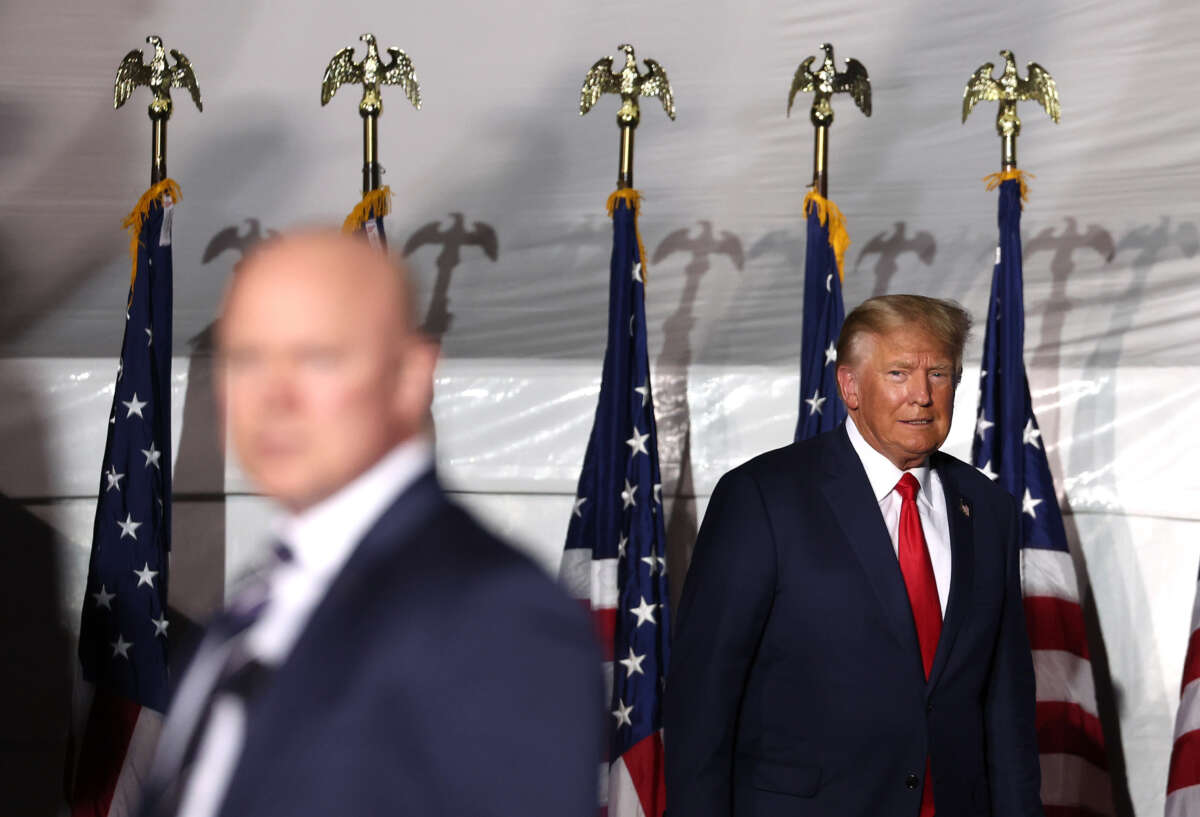 Former President Donald Trump greets supporters during a campaign rally at Minden-Tahoe Airport on October 8, 2022, in Minden, Nevada.