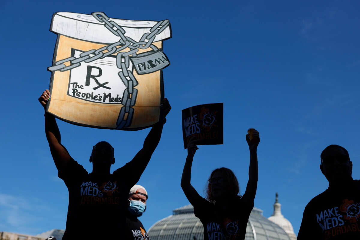 Activists protest the price of prescription drug costs in front of the U.S. Department of Health and Human Services building on October 6, 2022, in Washington, D.C.