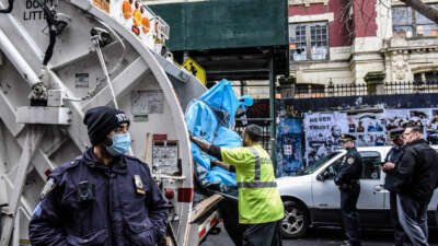 A tent from the homeless encampment is destroyed as New York City police work with the Department of Sanitation to clear a homeless encampment near Tompkins Square Park on April 6, 2022, in the Manhattan borough in New York City.