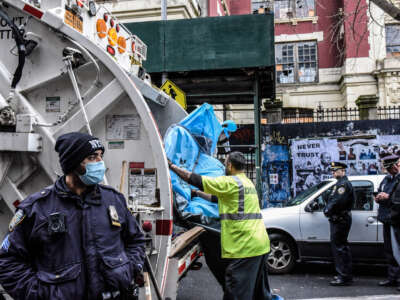 A tent from the homeless encampment is destroyed as New York City police work with the Department of Sanitation to clear a homeless encampment near Tompkins Square Park on April 6, 2022, in the Manhattan borough in New York City.