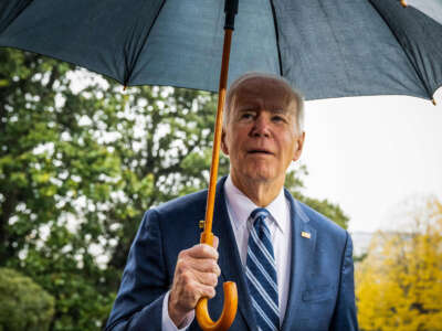 President Joe Biden speaks to the media as he walks to Marine One prior to departing from the South Lawn of the White House in Washington, D.C., on December 6, 2022.