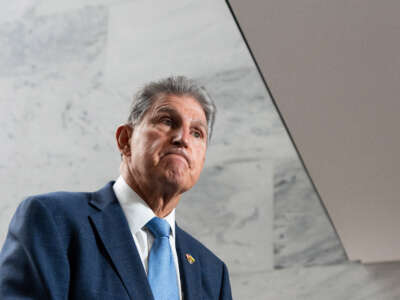 Sen. Joe Manchin speaks to the cameras about the reconciliation bill in the Hart Senate Office Building on August 1, 2022.