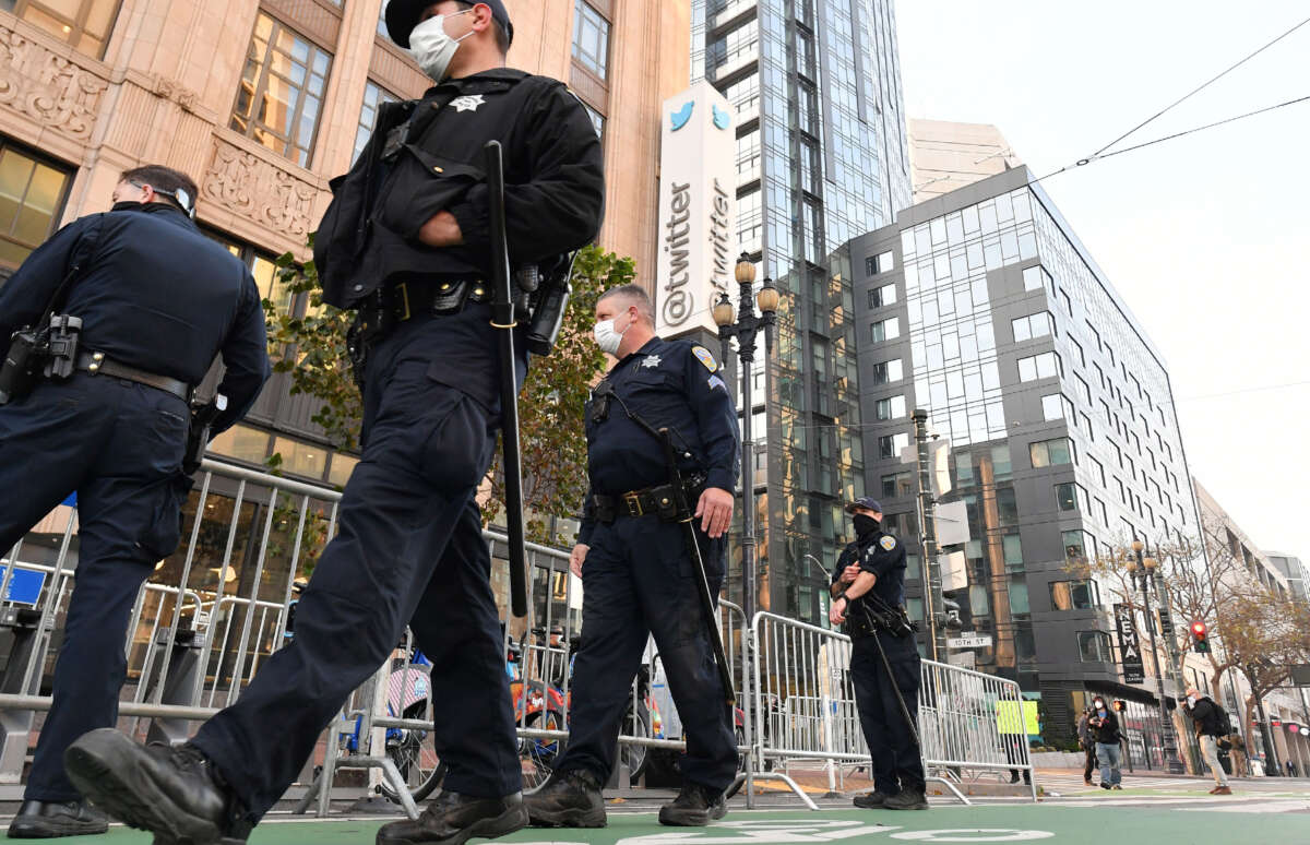 Police put together barricades in anticipation of a protest outside Twitter corporate headquarters in San Francisco, California, on January 11, 2021.