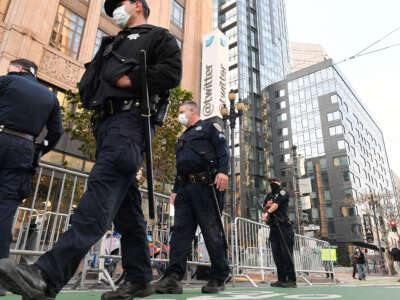 Police put together barricades in anticipation of a protest outside Twitter corporate headquarters in San Francisco, California, on January 11, 2021.