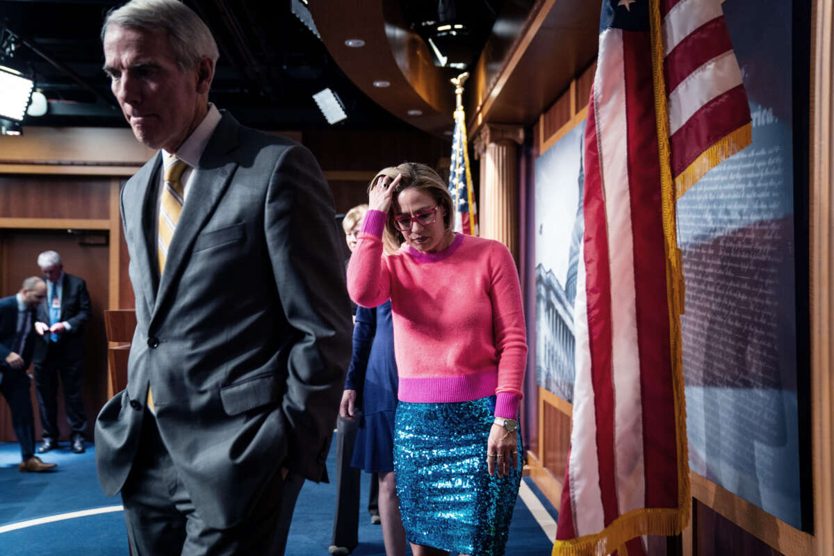 Senators Rob Portman, Kyrsten Sinema, Susan Collins and Tammy Baldwin depart a news conference in the U.S. Capitol Building following a vote to pass the Respect For Marriage Act on November 29, 2022, in Washington, D.C.