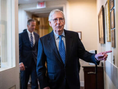 Senate Minority Leader Mitch McConnell arrives to a news conference after being re-elected as the leader of the Senate Republican Conference in the U.S. Capitol on November 16, 2022.