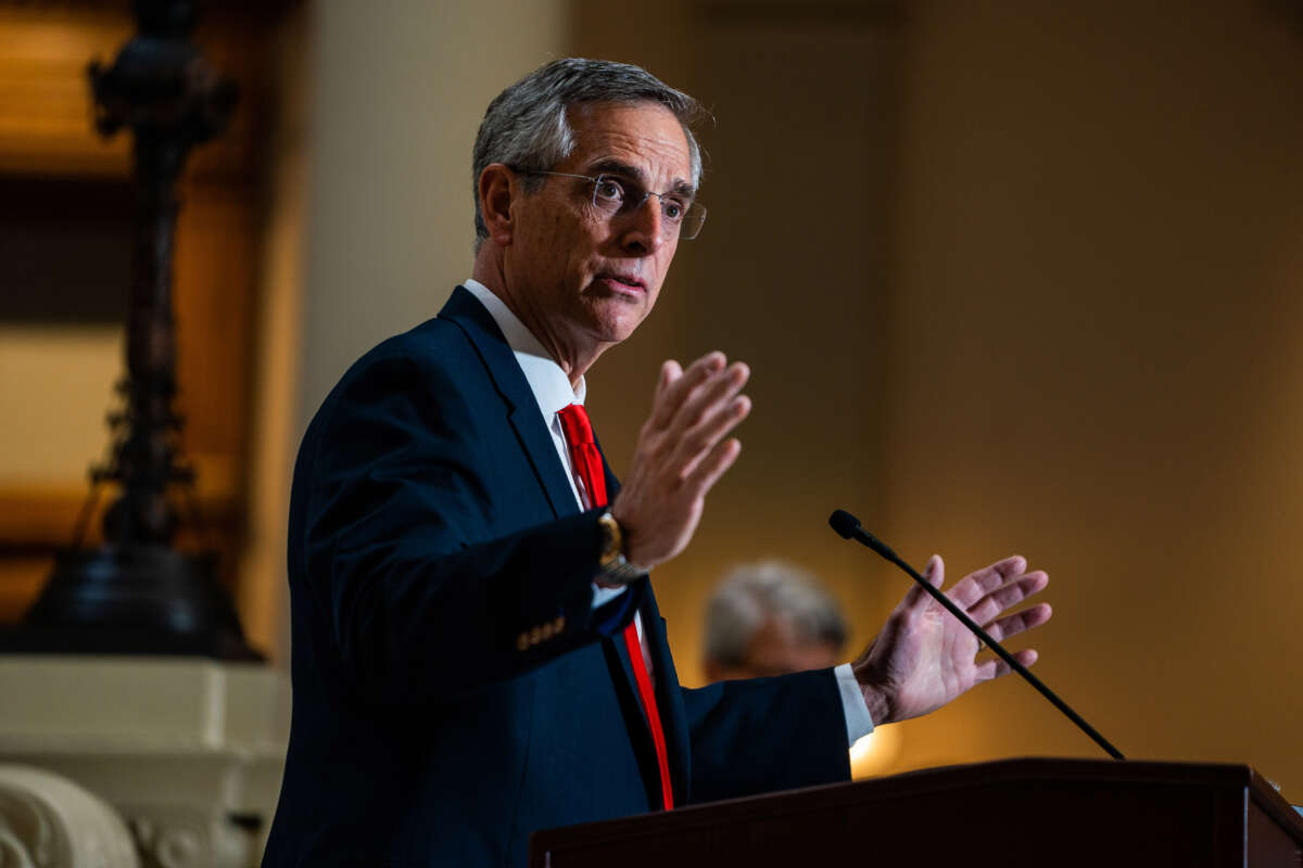 Georgia Secretary of State Brad Raffensperger speak to reporters at the State Capitol Building in Atlanta, Georgia, on November 9, 2022.