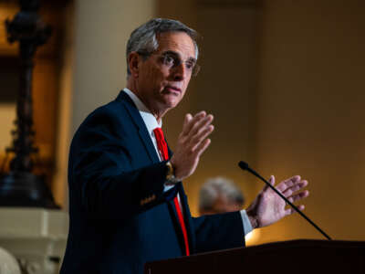 Georgia Secretary of State Brad Raffensperger speak to reporters at the State Capitol Building in Atlanta, Georgia, on November 9, 2022.