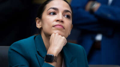 Rep. Alexandria Ocasio-Cortez listens during testimony at the U.S. Capitol on December 13, 2022.