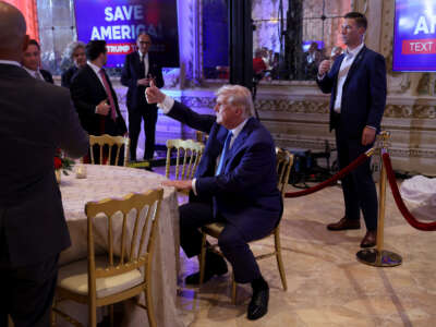 Former President Donald Trump gestures during an election night event at Mar-a-Lago on November 8, 2022, in Palm Beach, Florida.