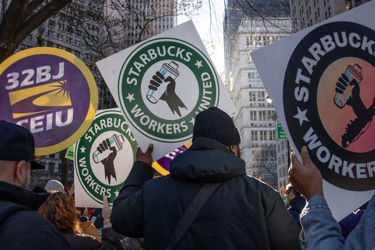 Members of a recently formed union of Starbucks workers hold a rally to celebrate the first anniversary of their founding, December 9, 2022, in New York City, New York.