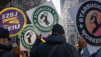 Members of a recently formed union of Starbucks workers hold a rally to celebrate the first anniversary of their founding, December 9, 2022, in New York City, New York.