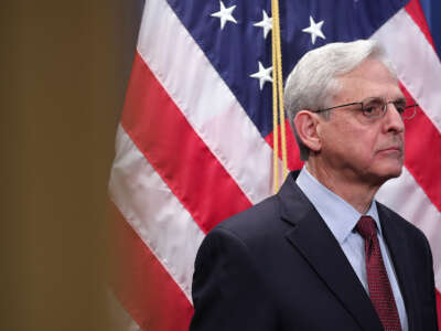 U.S. Attorney General Merrick Garland announces charges against former Honduran President Juan Orlando Hernández for cocaine trafficking in April 2022. While Garland took steps toward ending the sentencing disparity between crack and powder cocaine last week, the Justice Department is still engaged in a "war on drugs" ravaging Central America and the lower-income communities across the U.S.