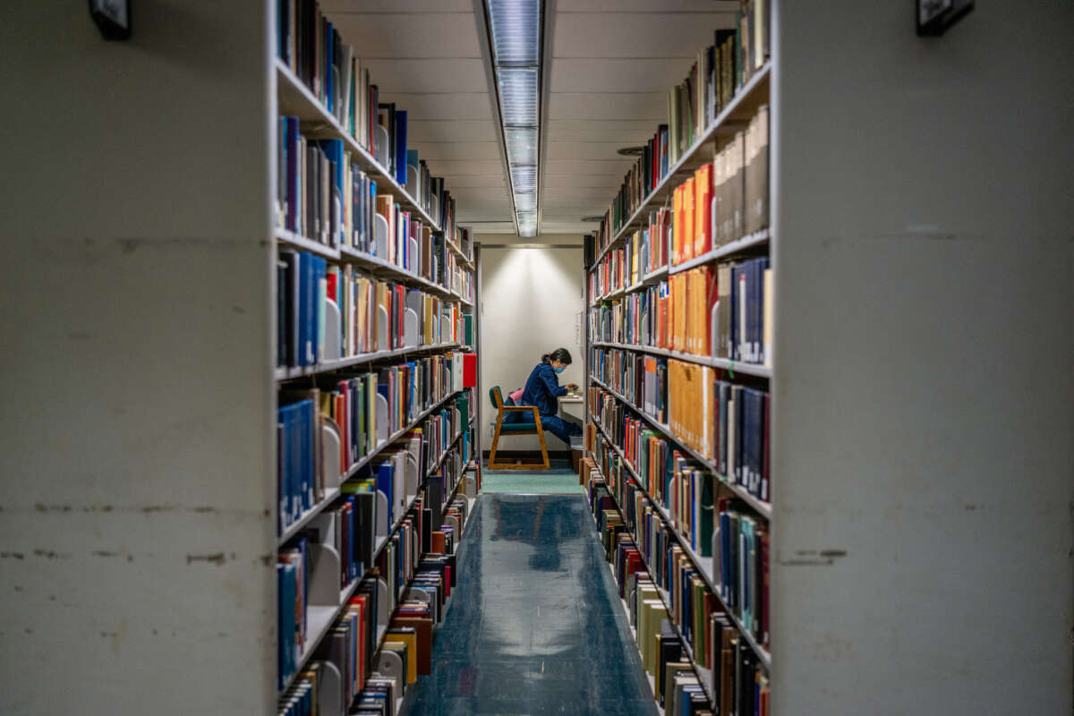 A person reads at the Rice University Library on April 26, 2022, in Houston, Texas.