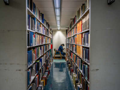 A person reads at the Rice University Library on April 26, 2022, in Houston, Texas.