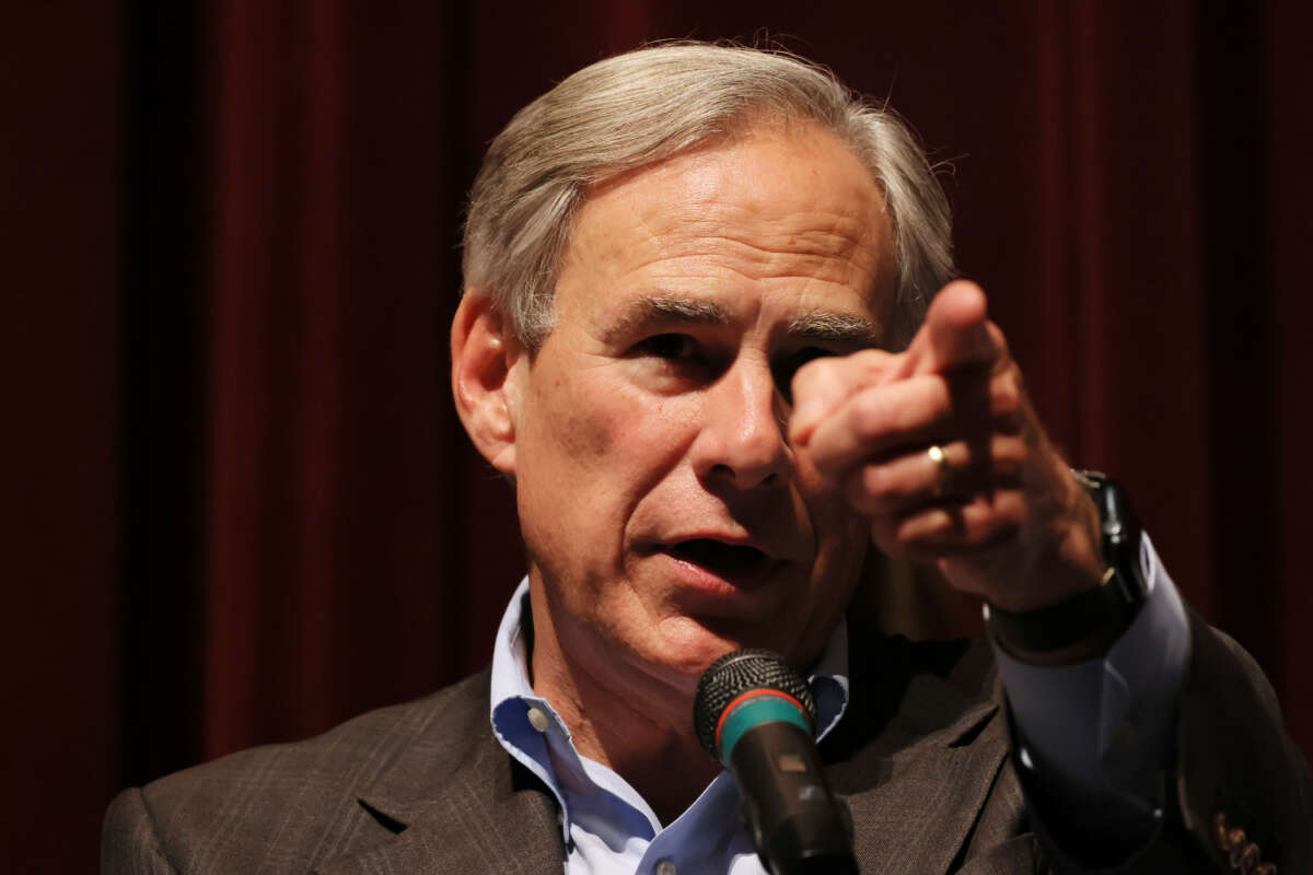 Gov. Greg Abbott points to a reporter during a press conference on May 27, 2022, in Uvalde, Texas.