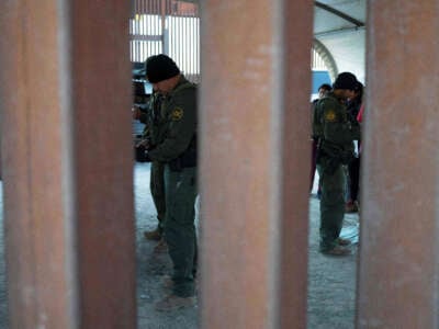 U.S. Border Patrol agents process asylum-seekers in San Luis, Arizona, on December 25, 2022.