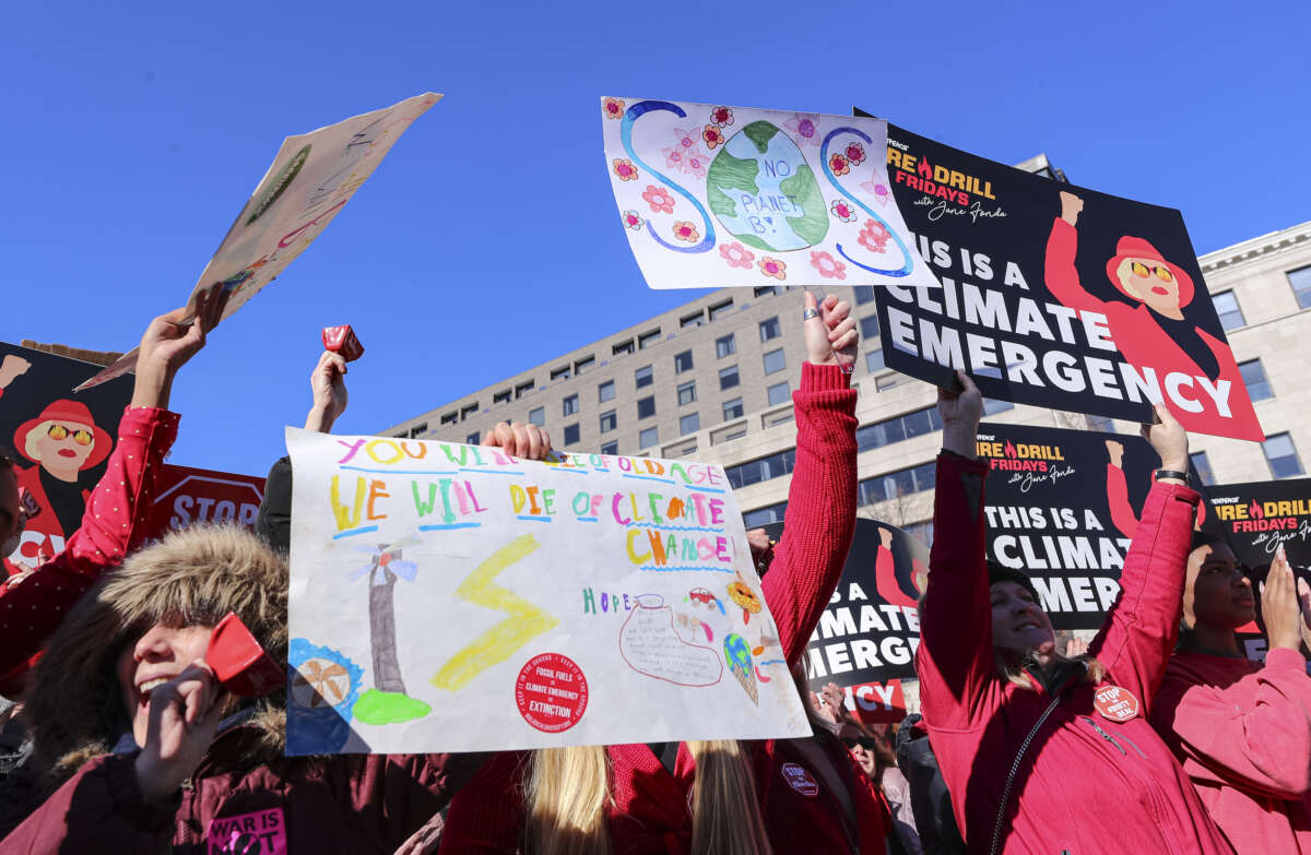 Environmental activists attend Fire Drill Fridays to call attention to the growing climate crisis and demand that President Biden declare a climate emergency at a rally in Freedom Plaza, on December 2, 2022, in Washington, D.C.