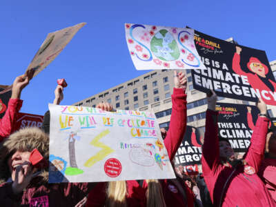 Environmental activists attend Fire Drill Fridays to call attention to the growing climate crisis and demand that President Biden declare a climate emergency at a rally in Freedom Plaza, on December 2, 2022, in Washington, D.C.