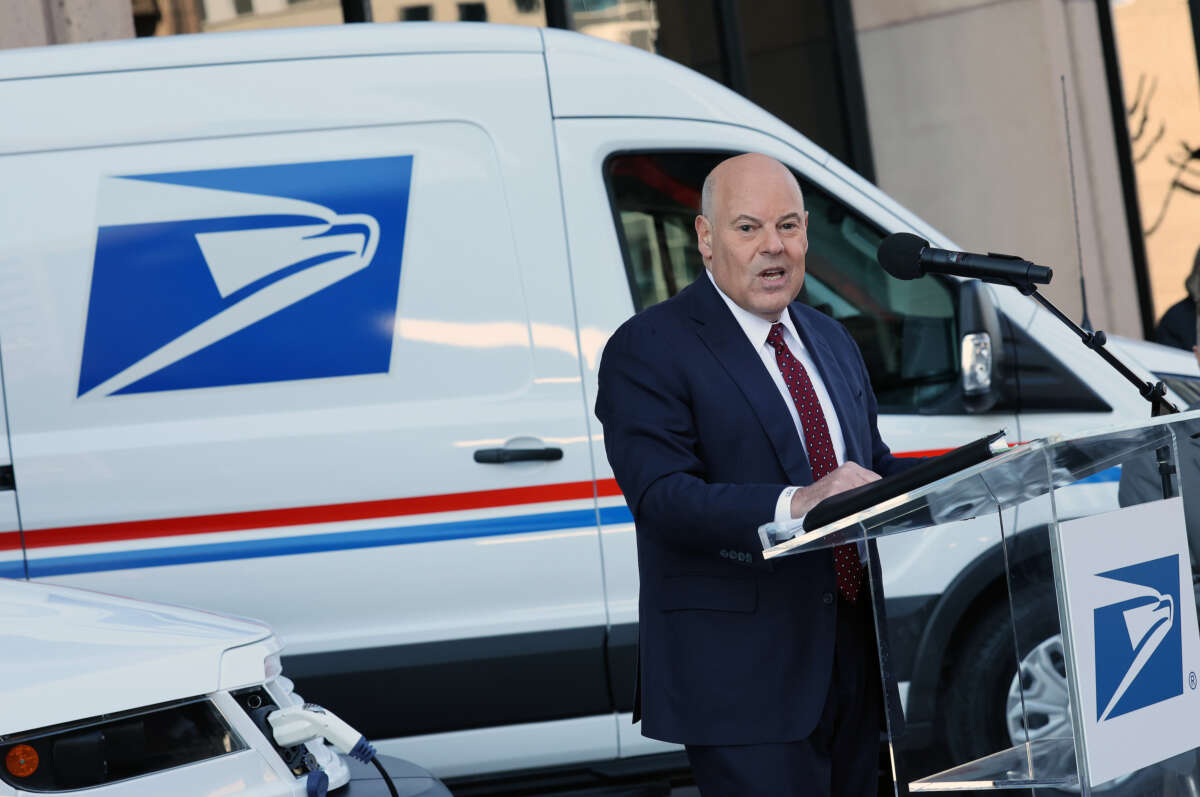Louis DeJoy, the U.S. Postmaster General, delivers remarks announcing the Postal Service's plan on implementing electric vehicles, at the Postal Service Headquarters on December 20, 2022, in Washington, D.C.