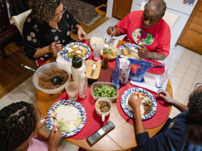 The Boynes family has dinner at their house in Silver Spring, Maryland on March 7, 2022.