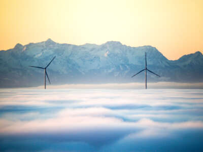 Two wind turbines rise out of the fog cover in Uttenweiler, Germany on the morning of November 27, 2022.